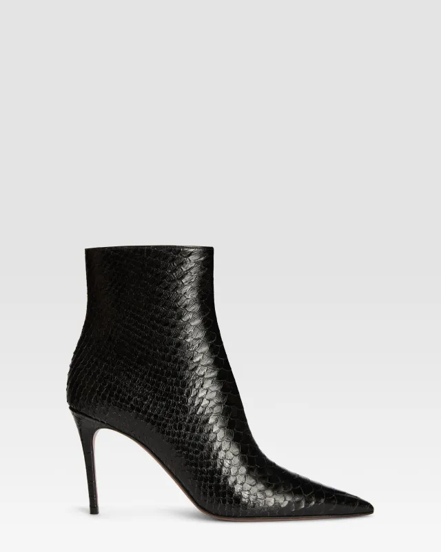 Ankle boots in black printed python leather sold by Paris Texas
