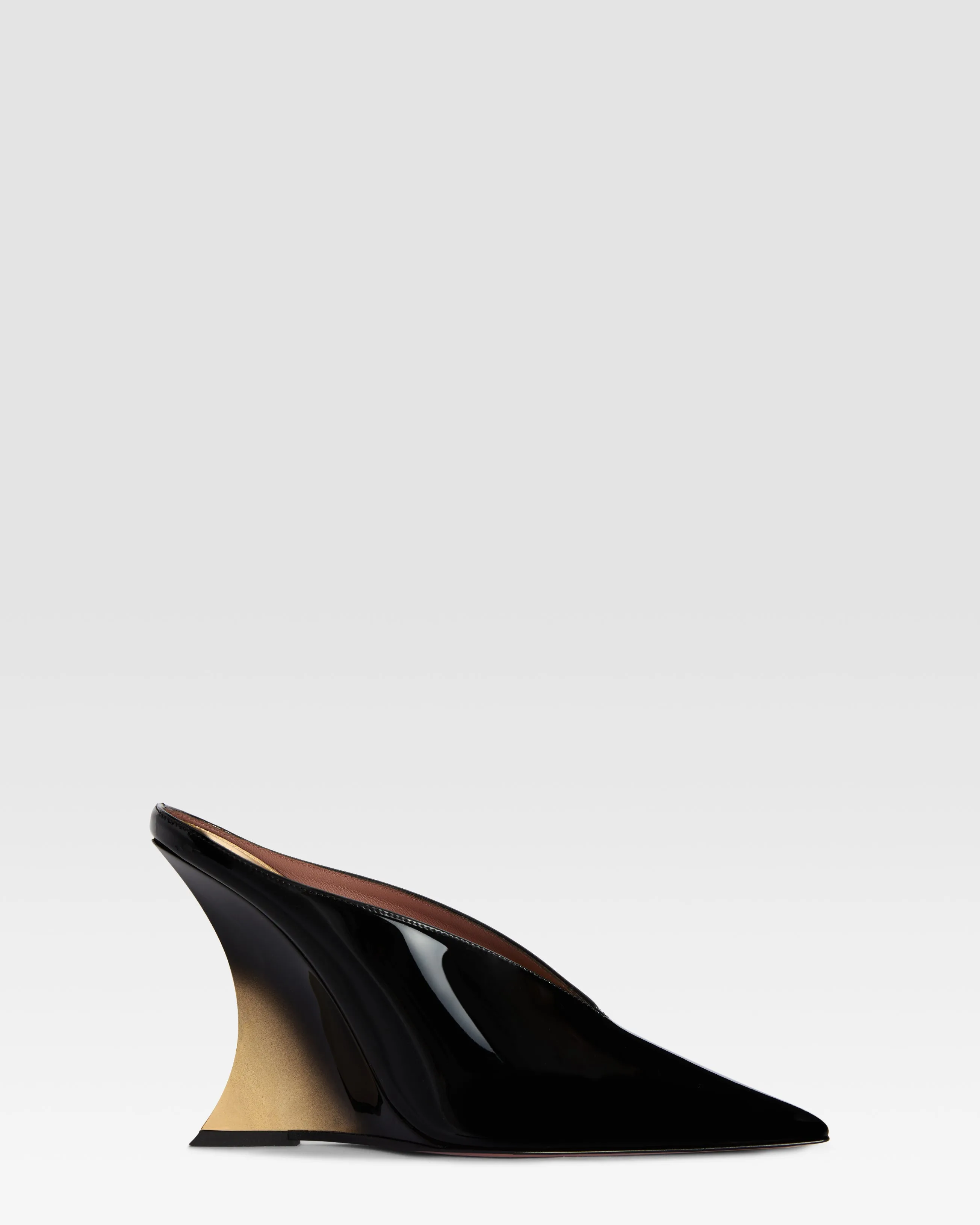 Patent leather mule sold by Paris Texas