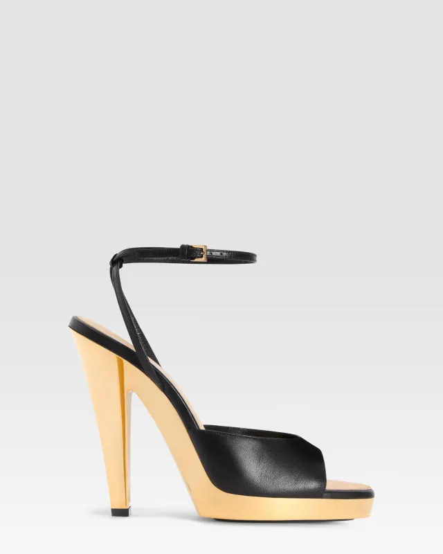 Ankle-strap sandals in shiny gold and black calf leather made by Paris Texas