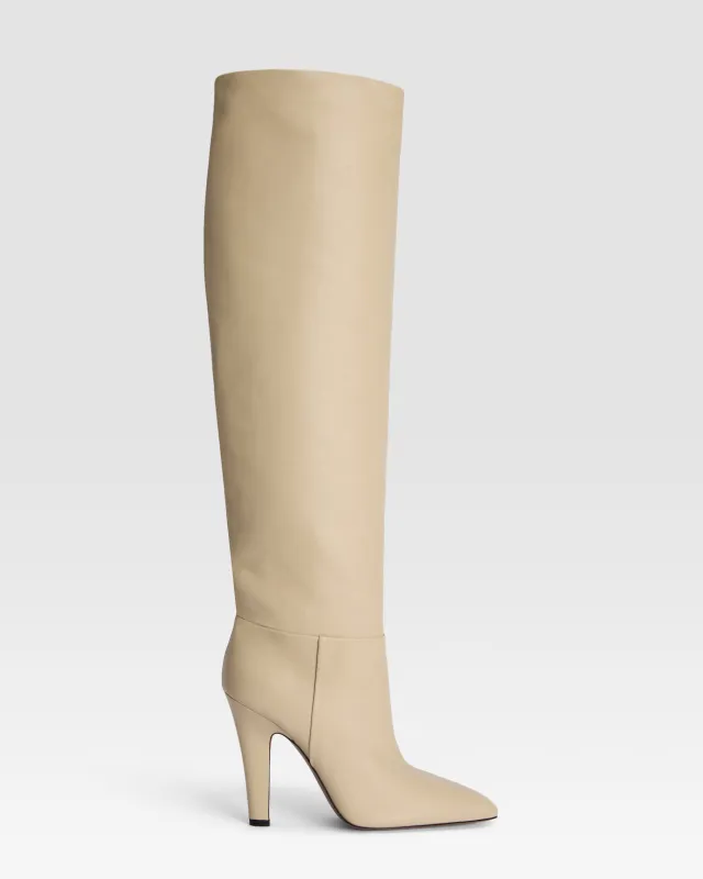 Boots in bone-colored leather sold by Paris Texas