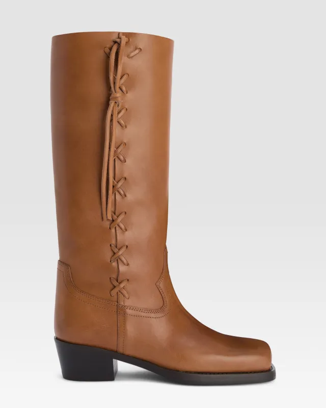 Boots in tan calf leather sold by Paris Texas