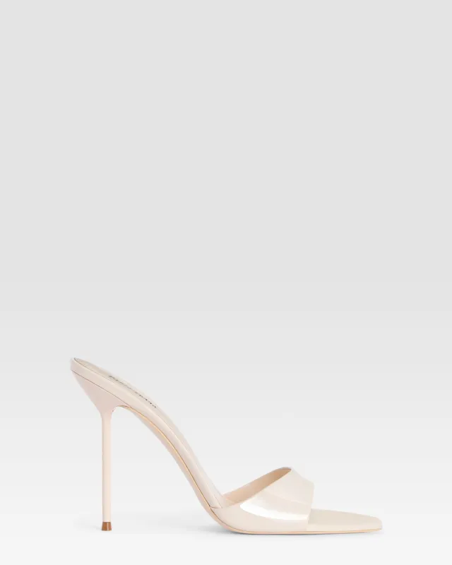 Mules in ivory patent leather made by Paris Texas