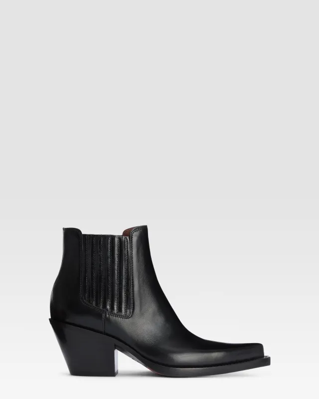 Texan ankle boots in shiny black calf leather sold by Paris Texas