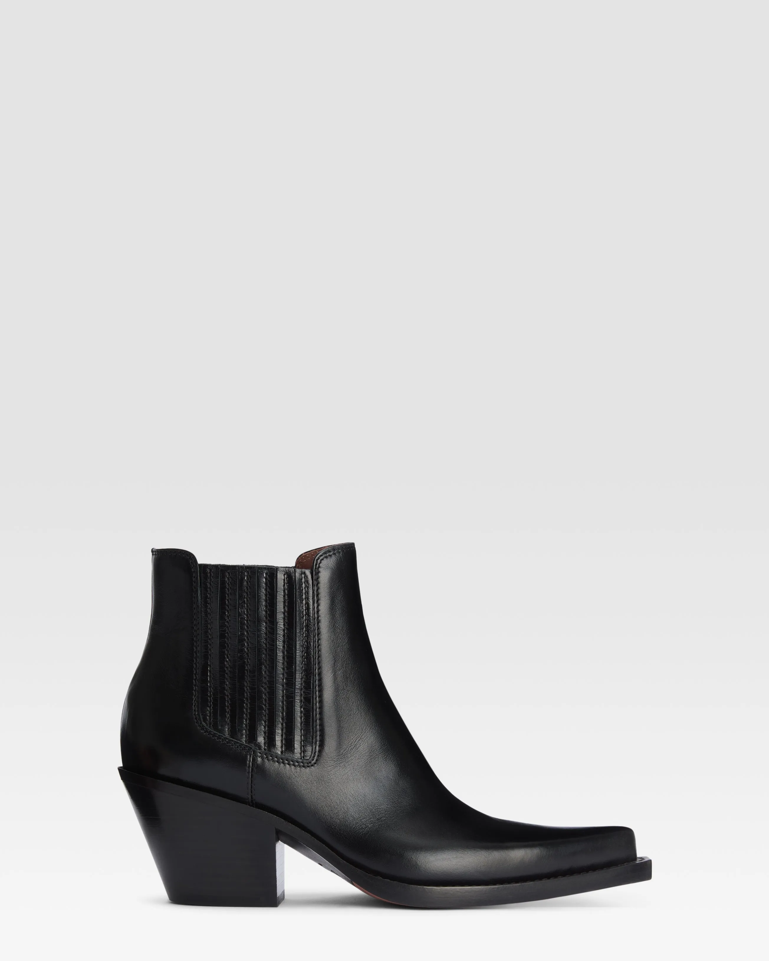 Texan ankle boots in shiny black calf leather sold by Paris Texas