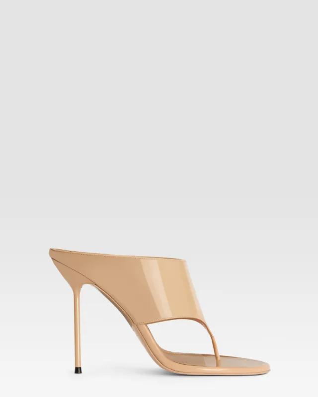 Thong mules in honey patent leather made by Paris Texas