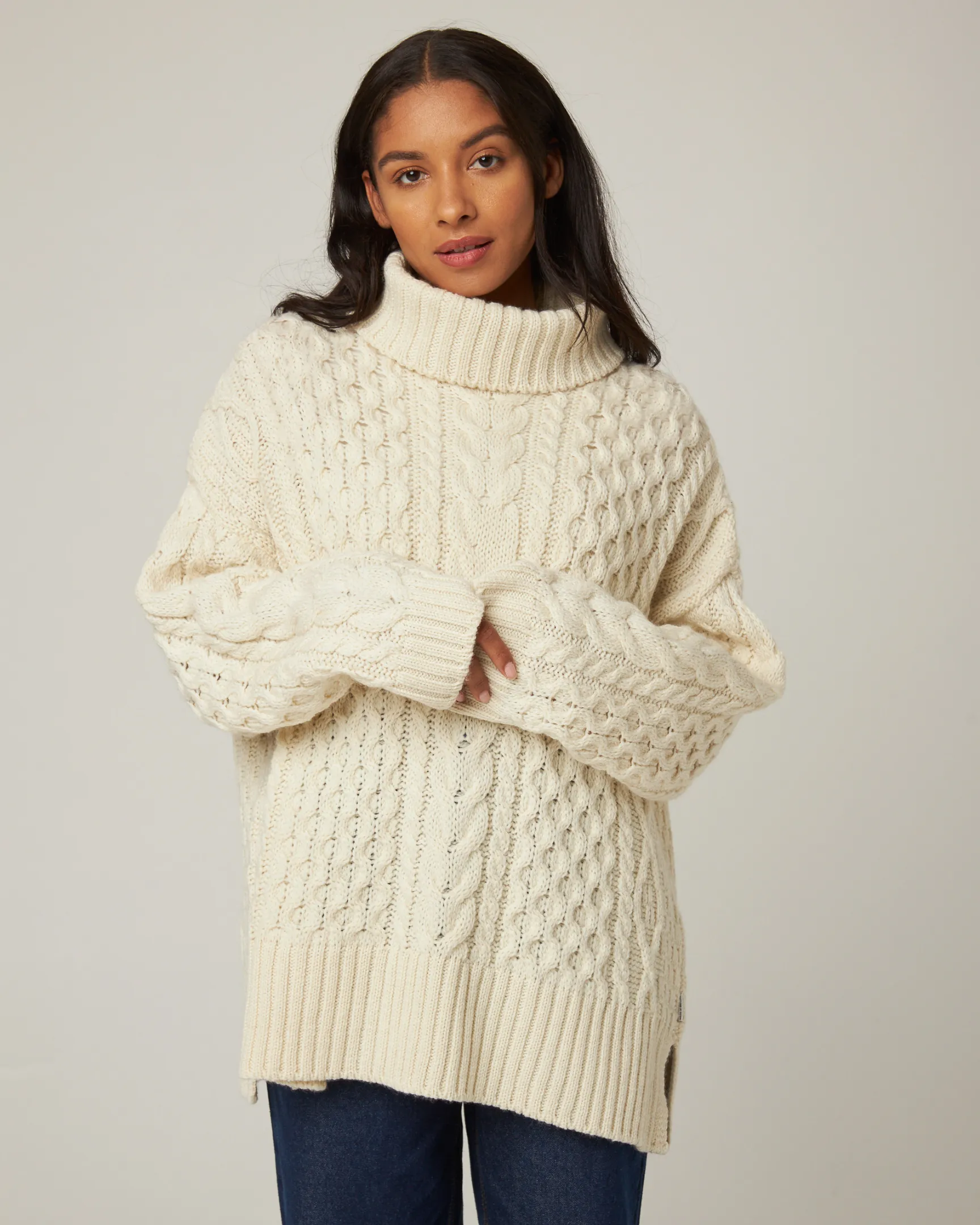 Martha Polo Neck Jumper sold by Peregrine