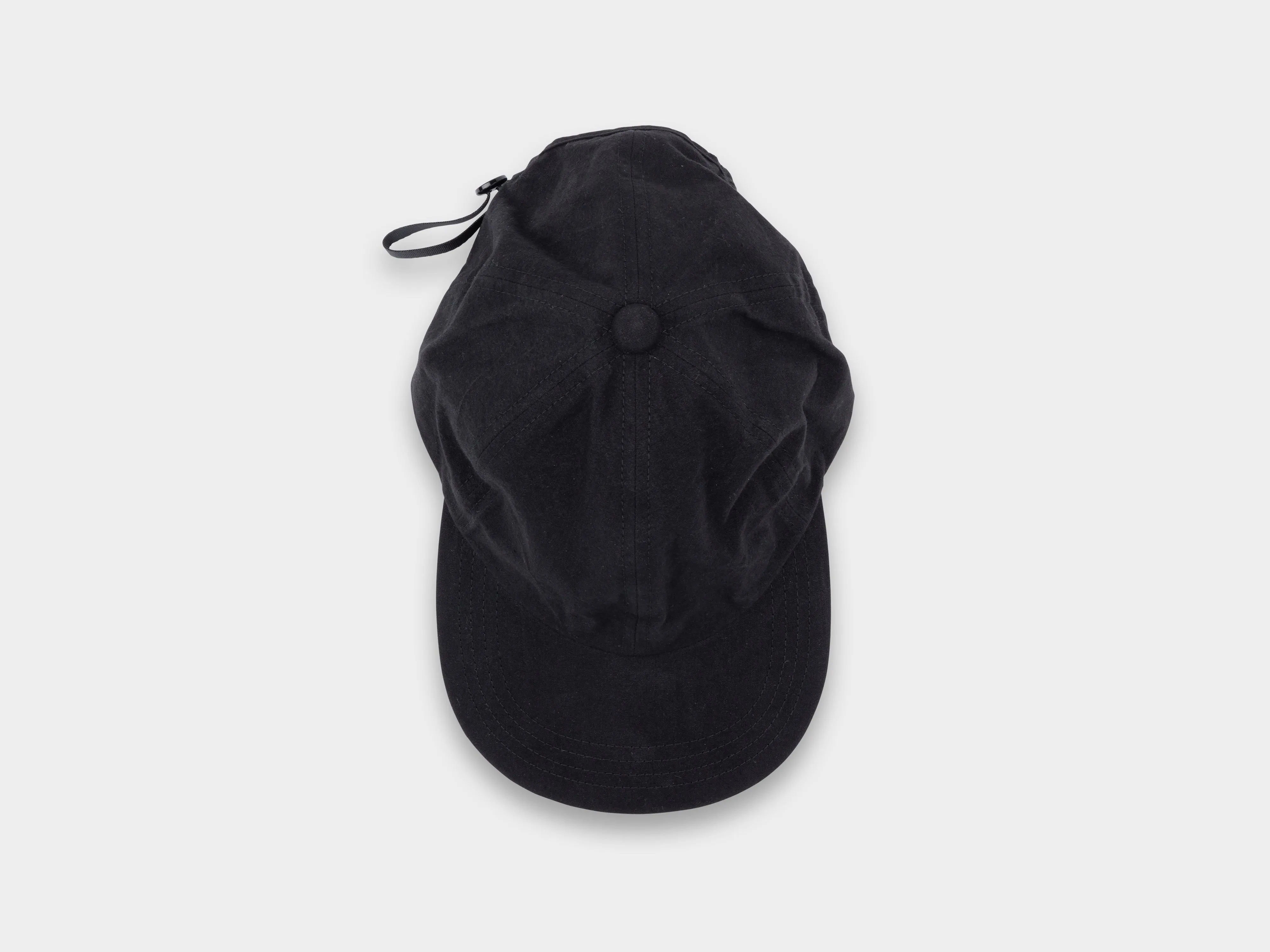R0C1 "Shallow Cap" Black Wax sold by MAN-TLE
