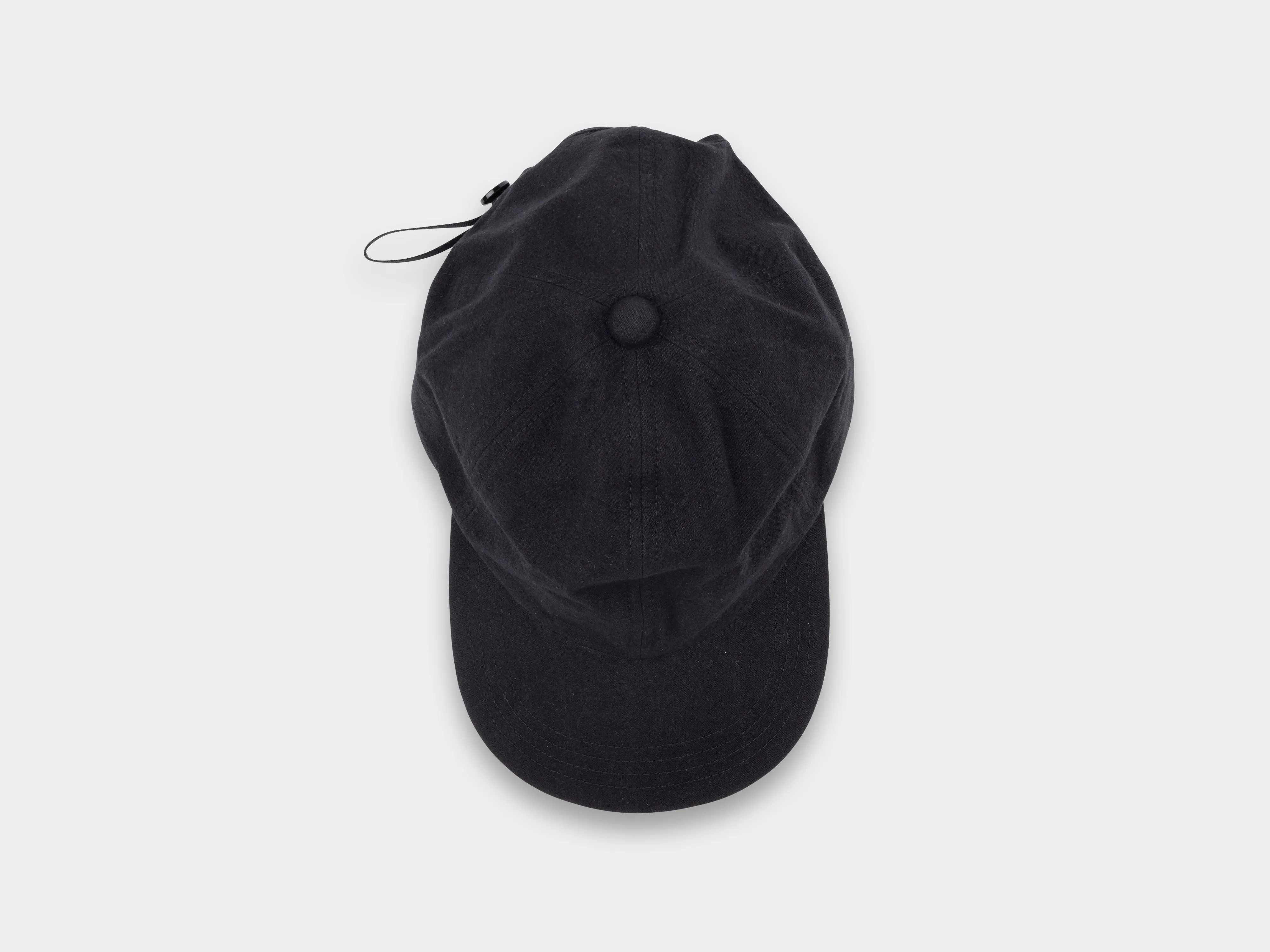 R0C1 "Shallow Cap" Black Wash sold by MAN-TLE
