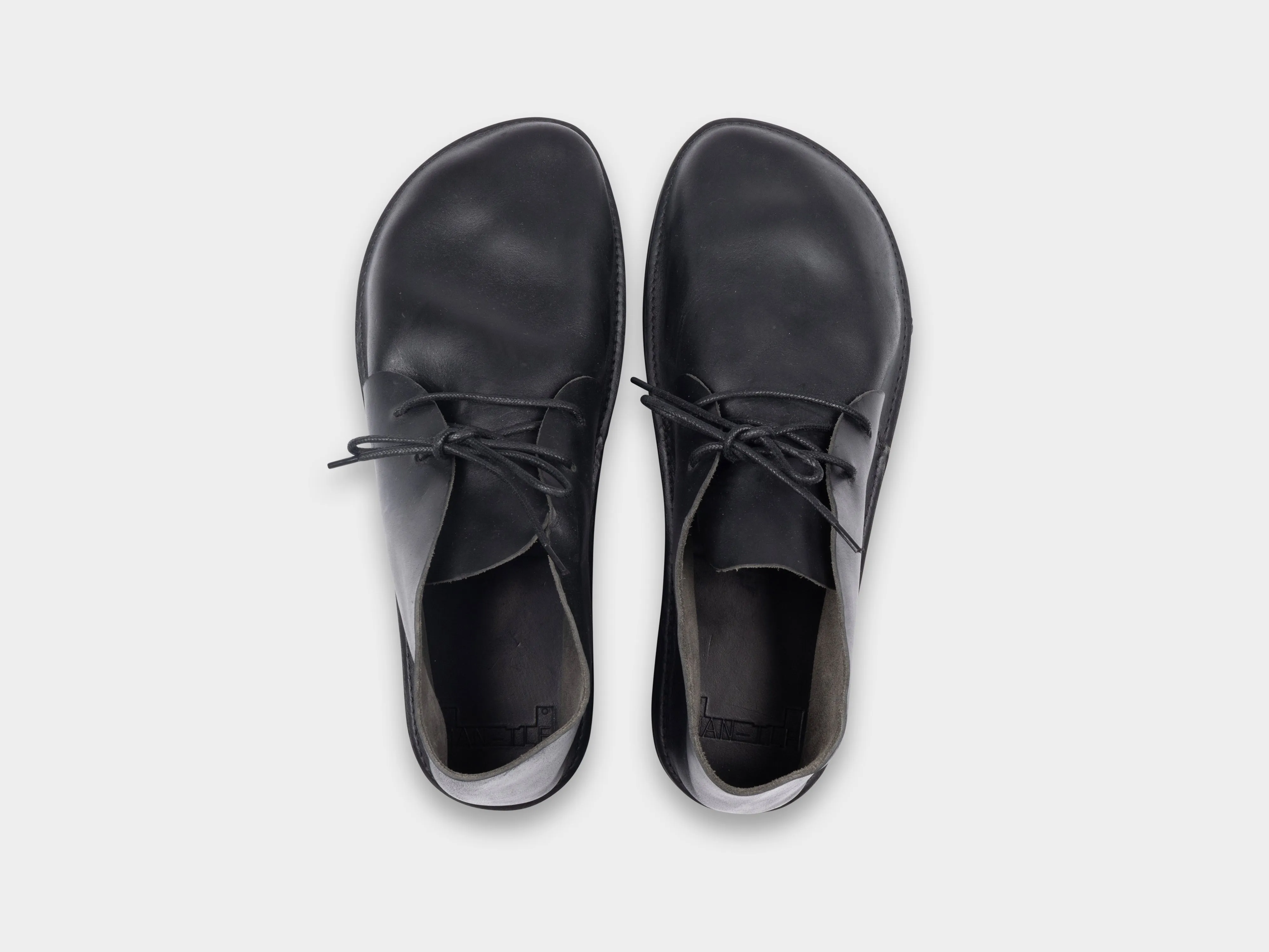 R0V2 "Aurora High" Black Horween sold by MAN-TLE