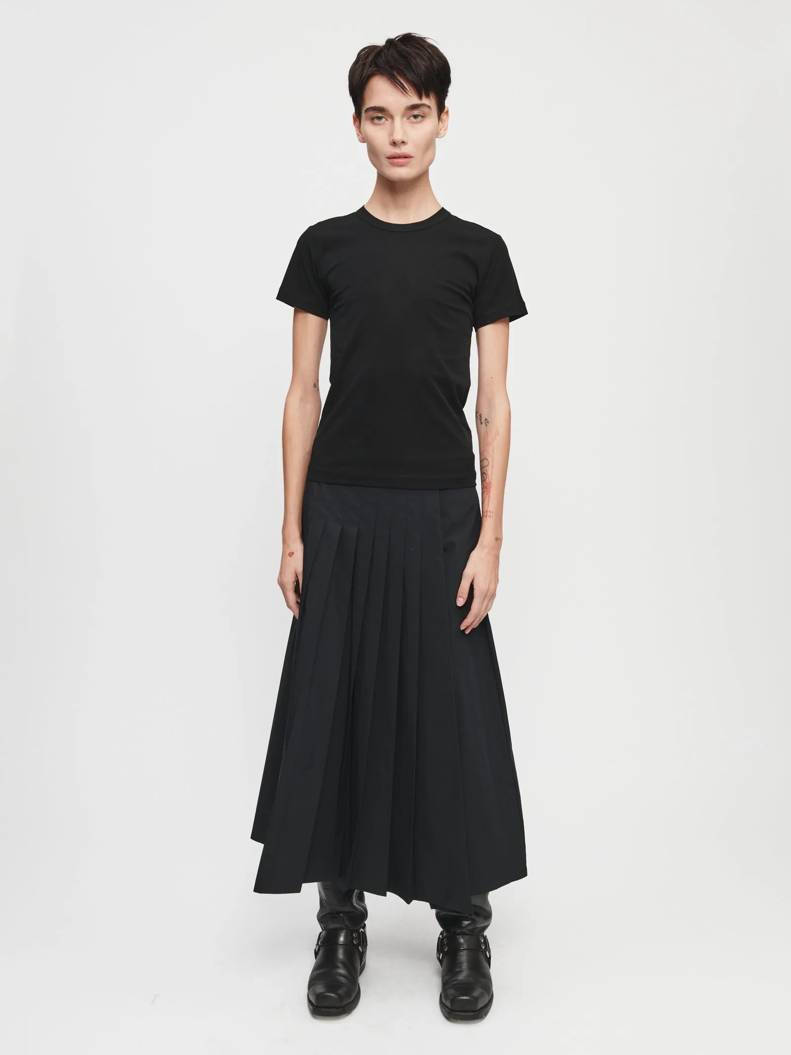 Pleated Wrap Skirt in Black sold by 6397