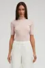Blush Cashmere Turtleneck sold by SPRWMN