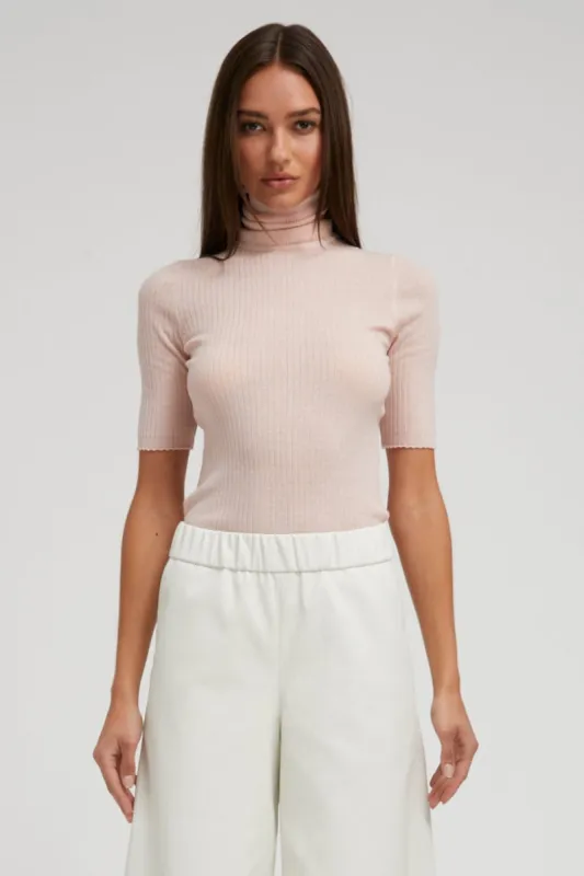 Blush Cashmere Turtleneck sold by SPRWMN