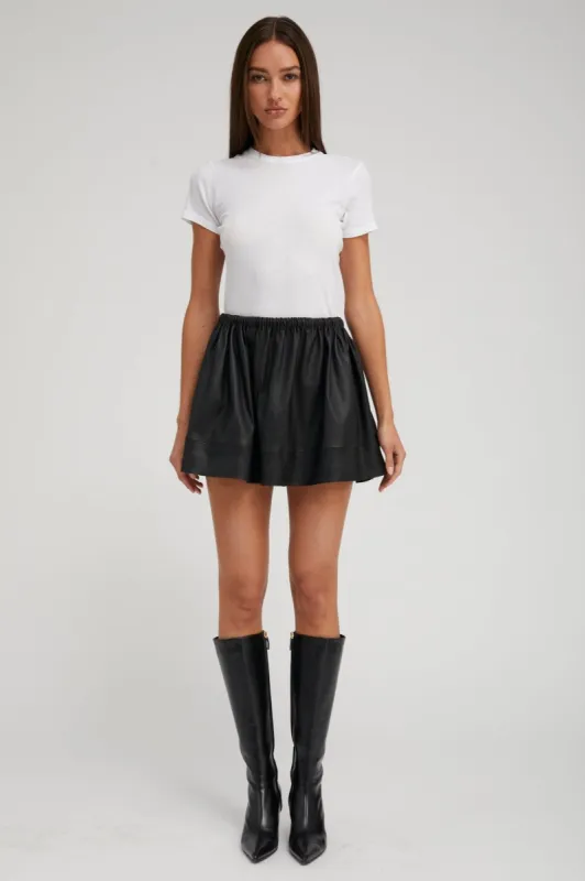 Black Leather Bell Mini Skirt sold by SPRWMN