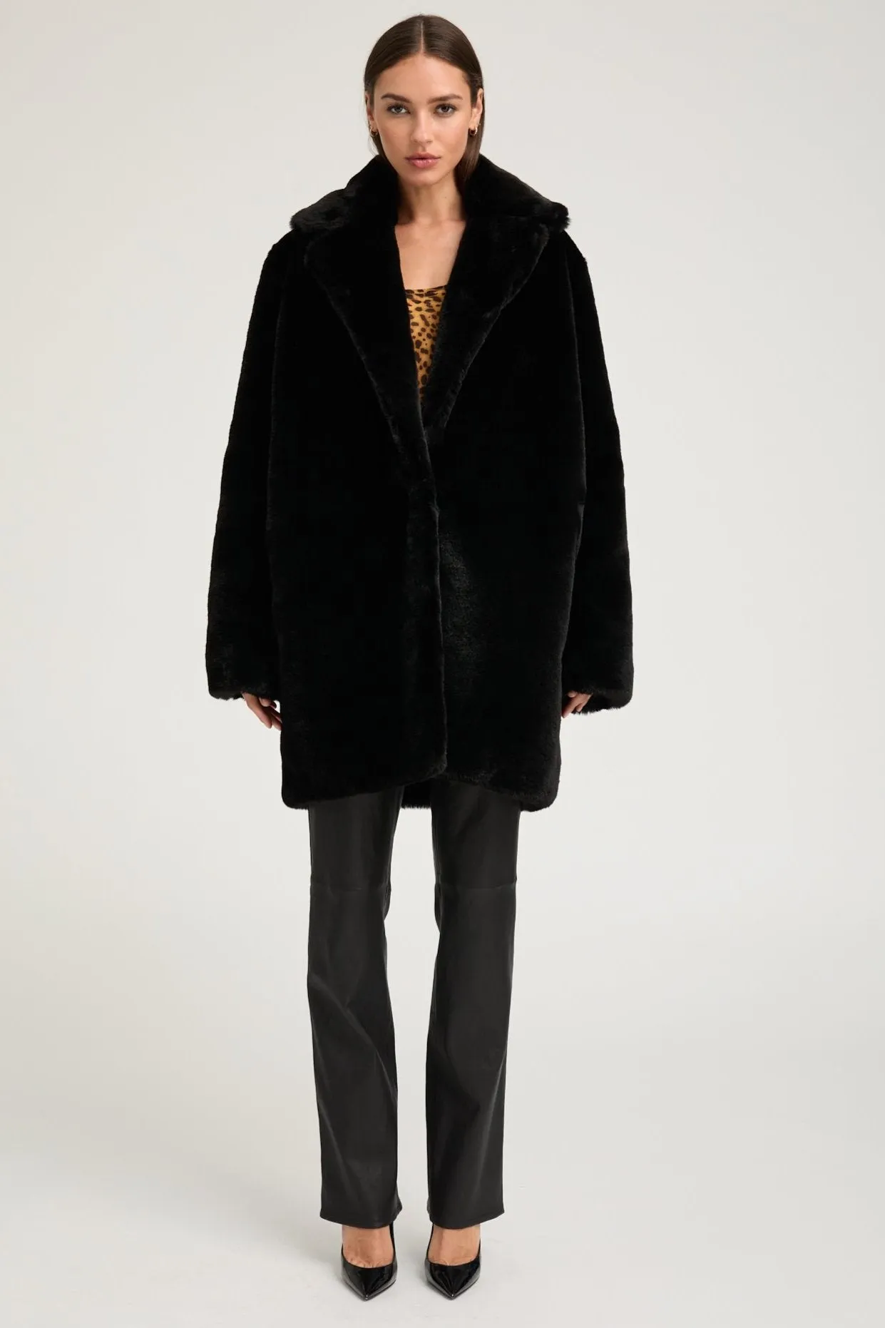 Black Faux Fur Short Classic Coat sold by SPRWMN