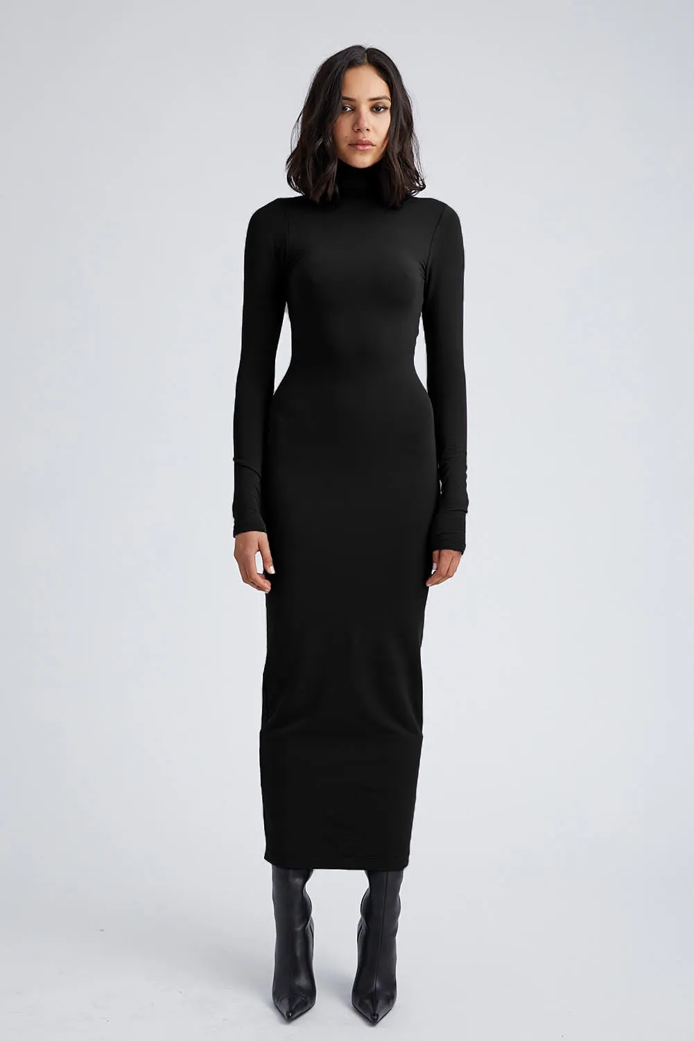 Black City Long Sleeve Turtleneck Dress sold by SPRWMN