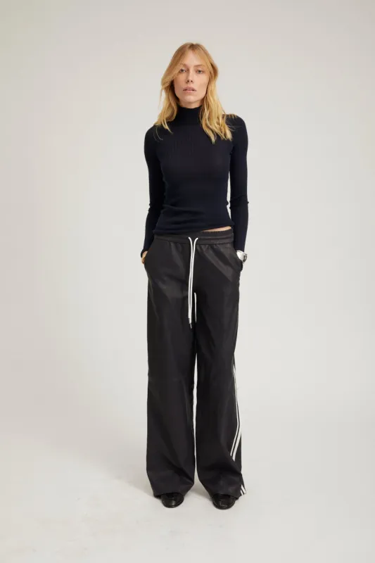 Navy Leather Baggy Athletic Pants sold by SPRWMN