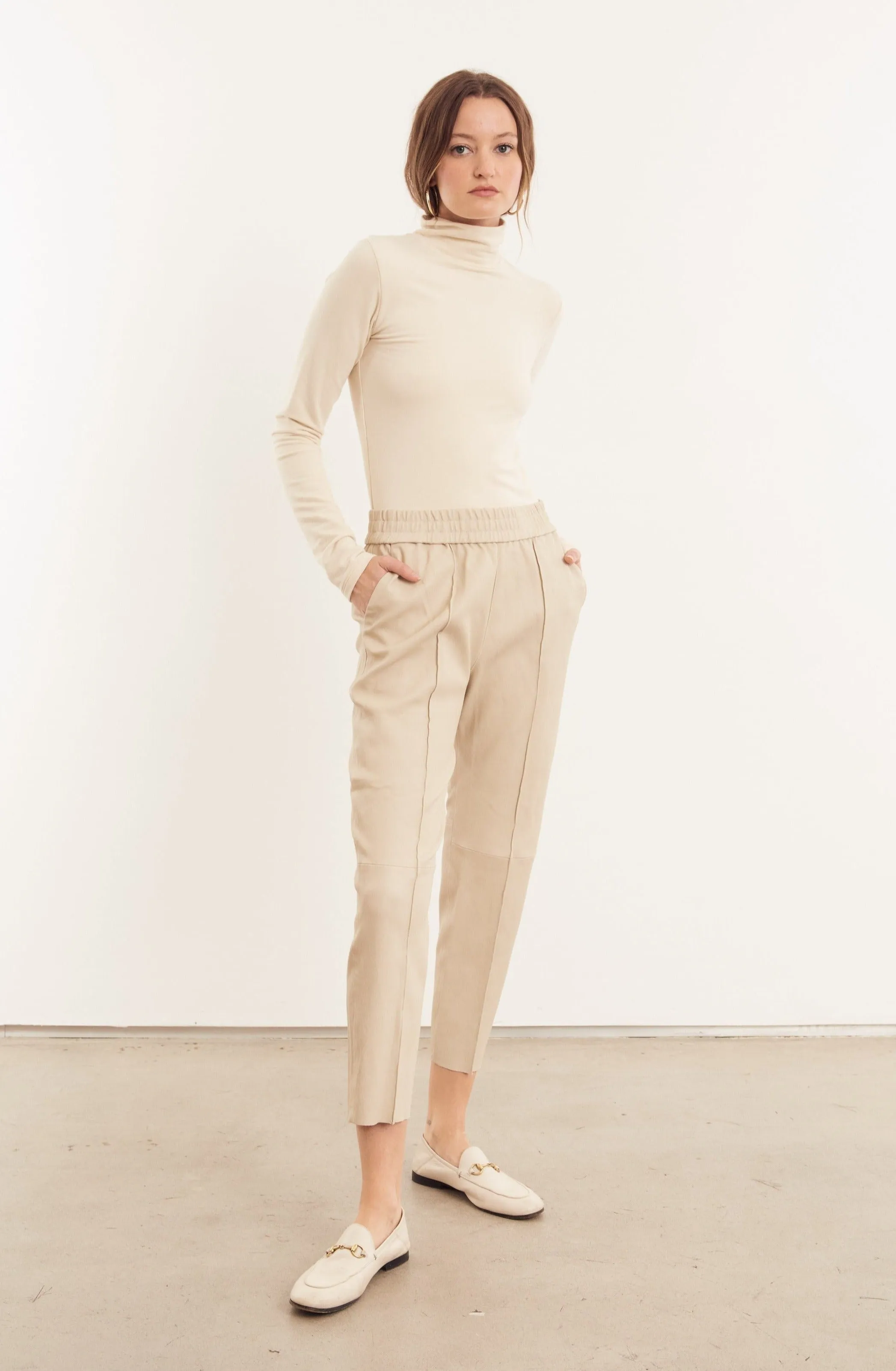 Off White Leather Joggers sold by SPRWMN