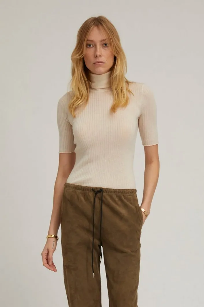Chalk Cashmere Turtleneck sold by SPRWMN