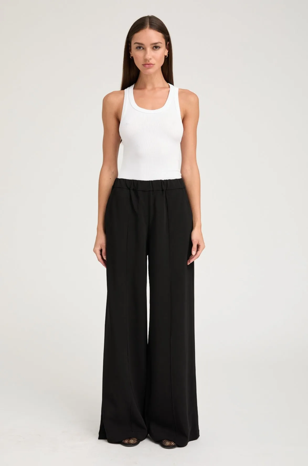 Black Crepe Wide Leg Pintuck Trousers sold by SPRWMN