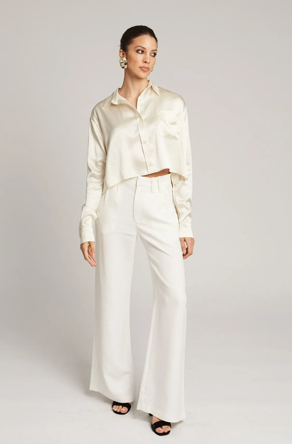 White Crepe Pleated Trousers sold by SPRWMN
