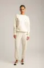 Vintage White Logo Sweatpants sold by SPRWMN