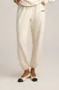 Vintage White Logo Sweatpants sold by SPRWMN