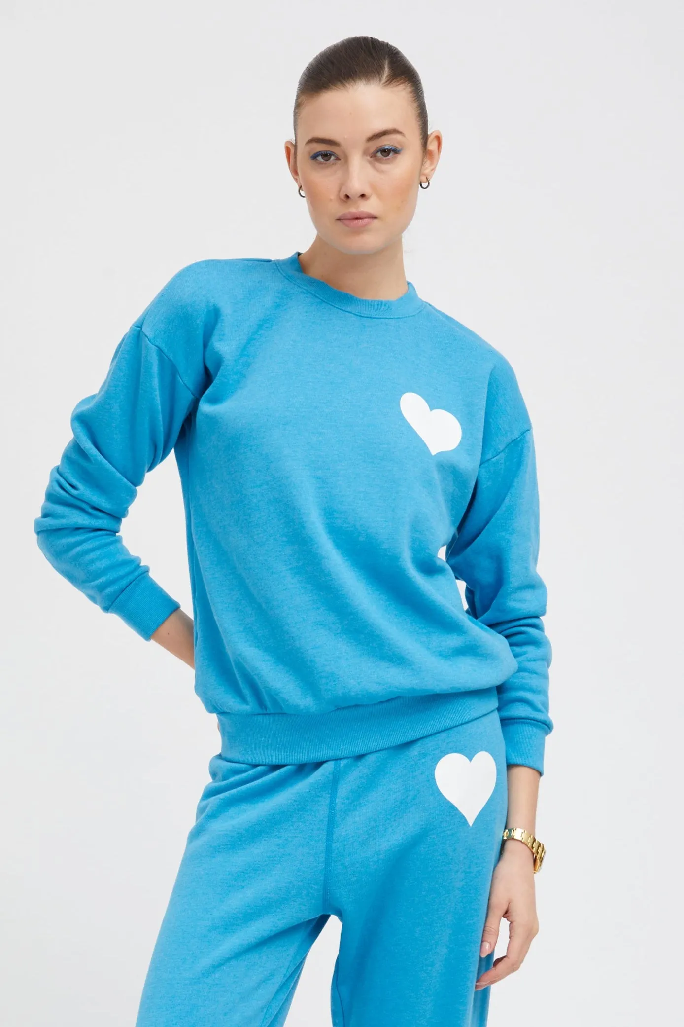 Turquoise Heart Sweatshirt sold by SPRWMN