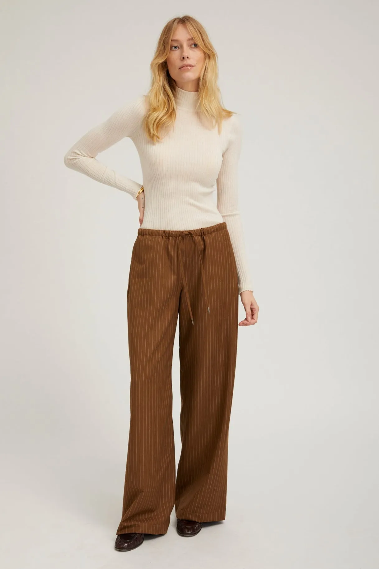 Camel Stripe Drawstring Pants sold by SPRWMN