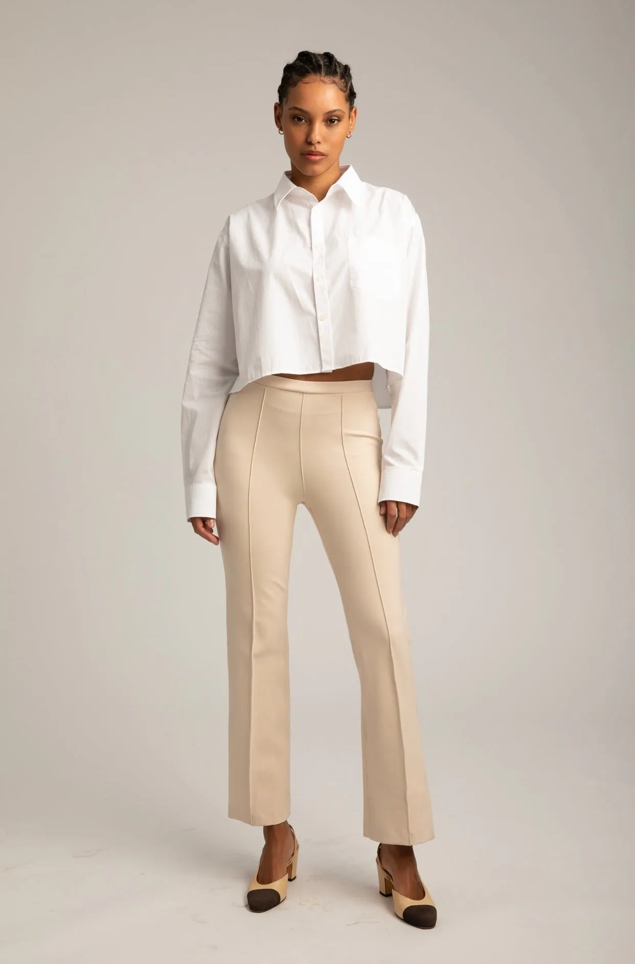 Cream Ankle Flare Pintuck Pants sold by SPRWMN