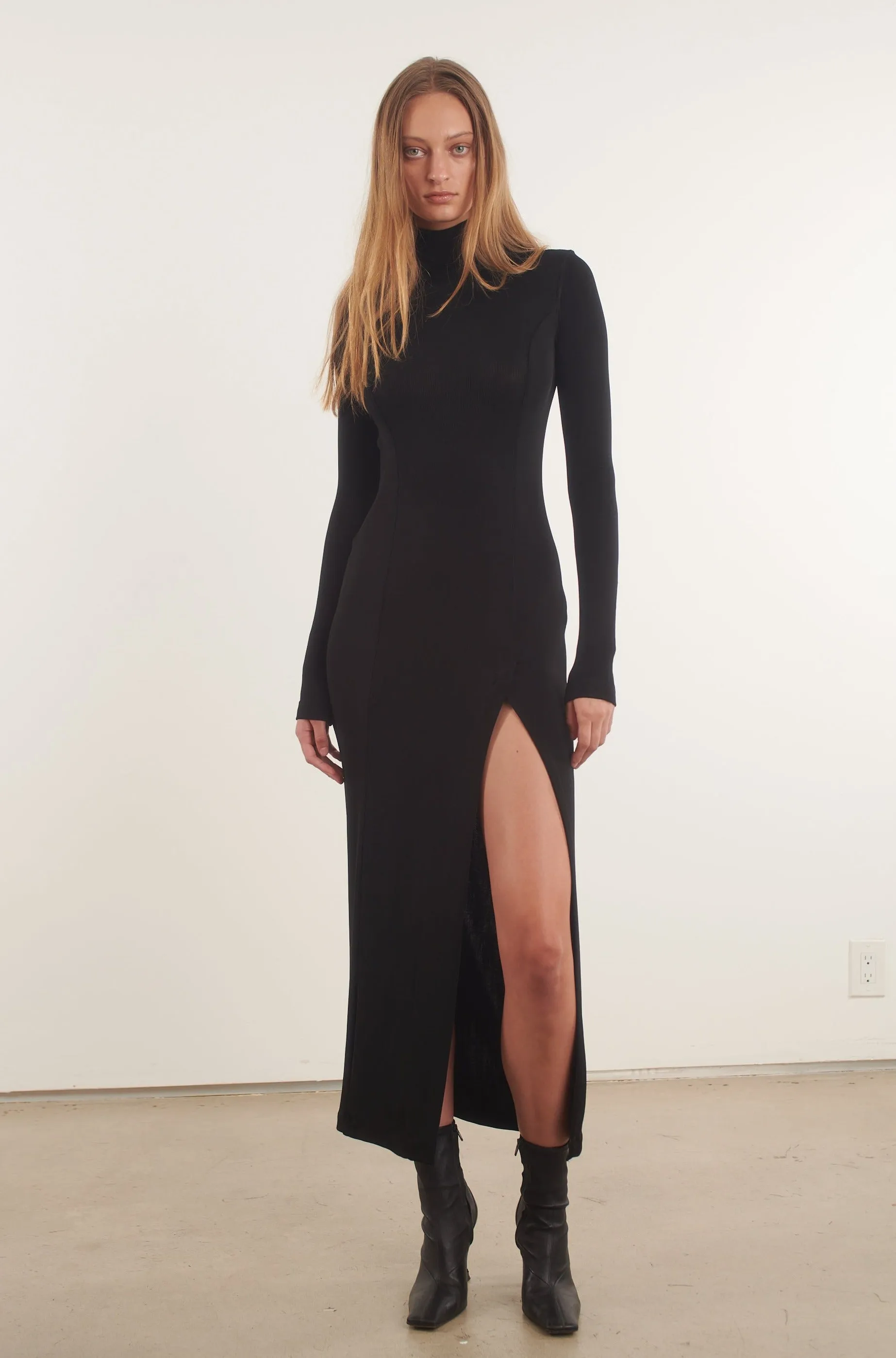 Black Slinky Mock Neck Maxi Dress sold by SPRWMN