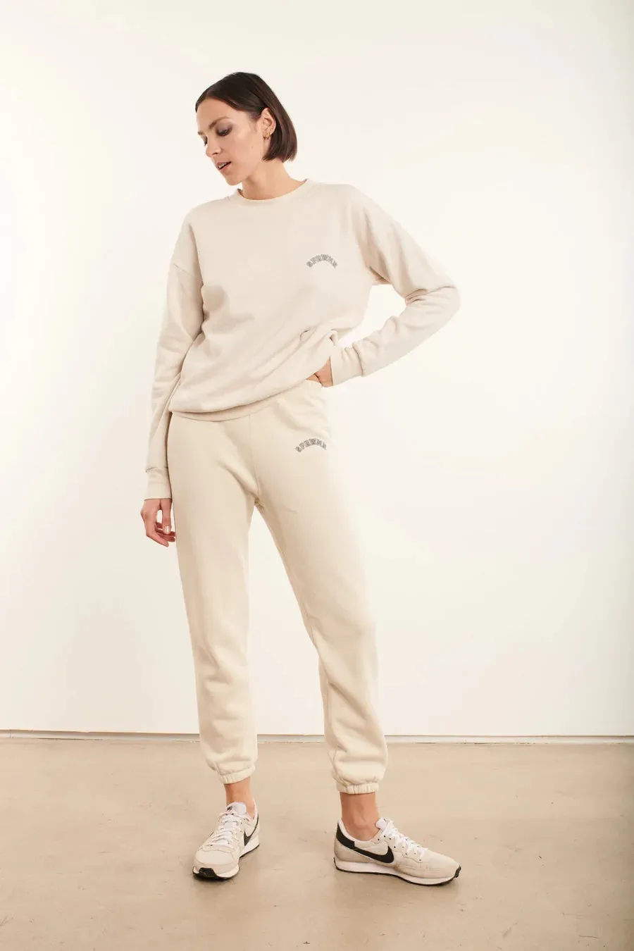 Vintage White College Logo Sweatpants sold by SPRWMN