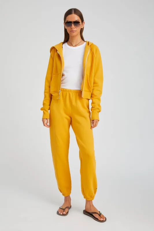 Mustard Cotton Mini Logo Sweatpants sold by SPRWMN