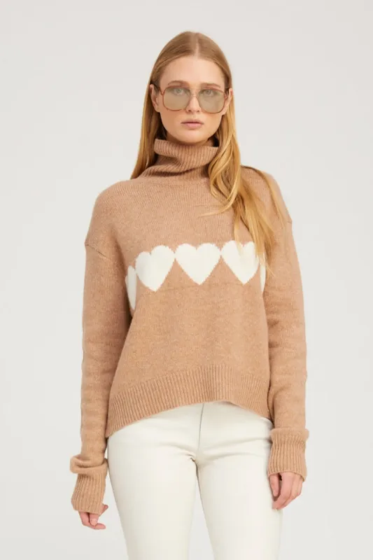 Almondine Cashmere Heart Turtleneck Sweater sold by SPRWMN
