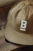 B Flat Waxed Cap / Brown sold by Bridge & Burn