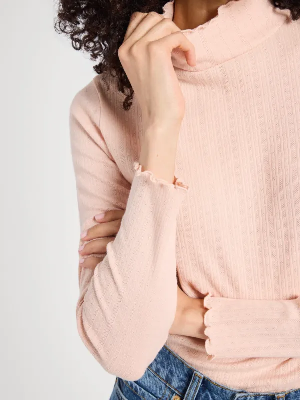 Carmela Pointelle Turtleneck in Spanish Villa sold by MILLE