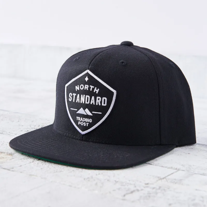 Snapback - Black with Black/White Shield sold by North Standard Trading Post