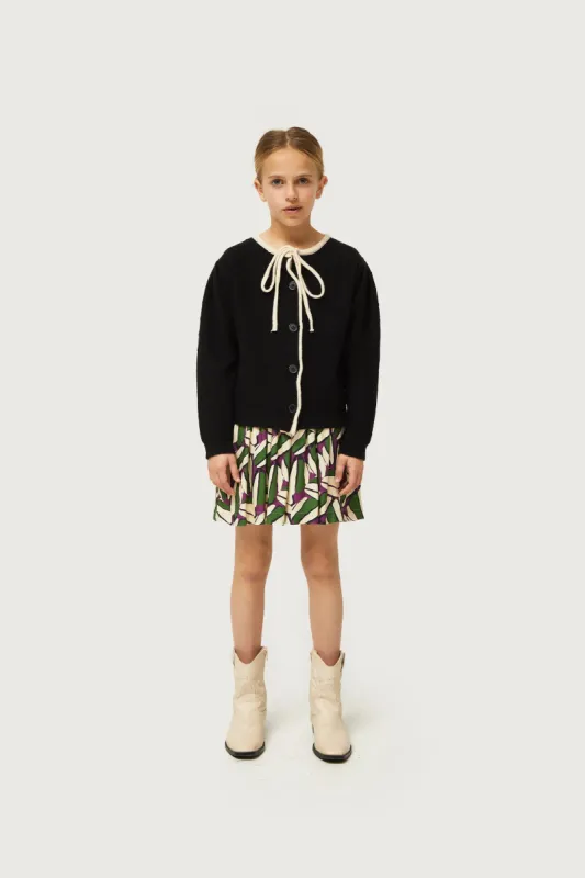 Cárdigan de niña con lazada negro sold by Compania Fantasica