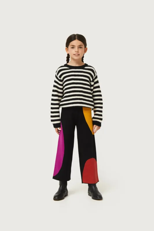 Pantalón de niña de punto jacquard estampado de círculos sold by Compania Fantasica