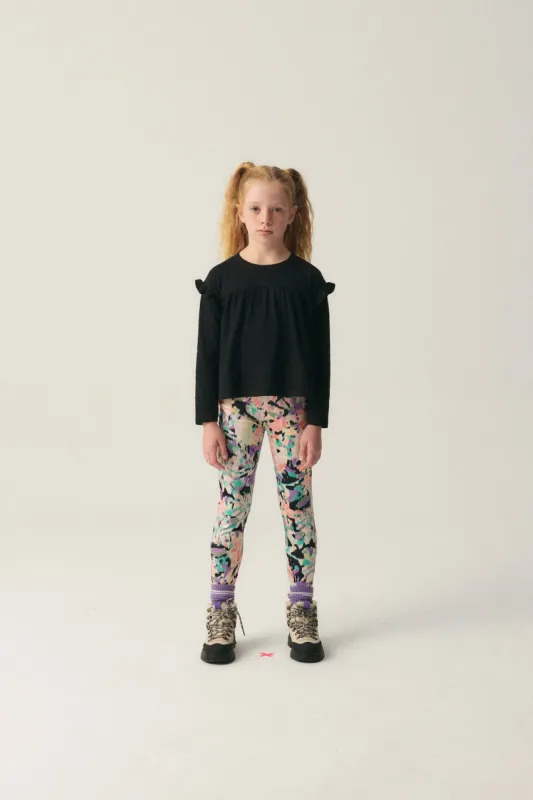 Top de niña con volantes negro sold by Compania Fantasica