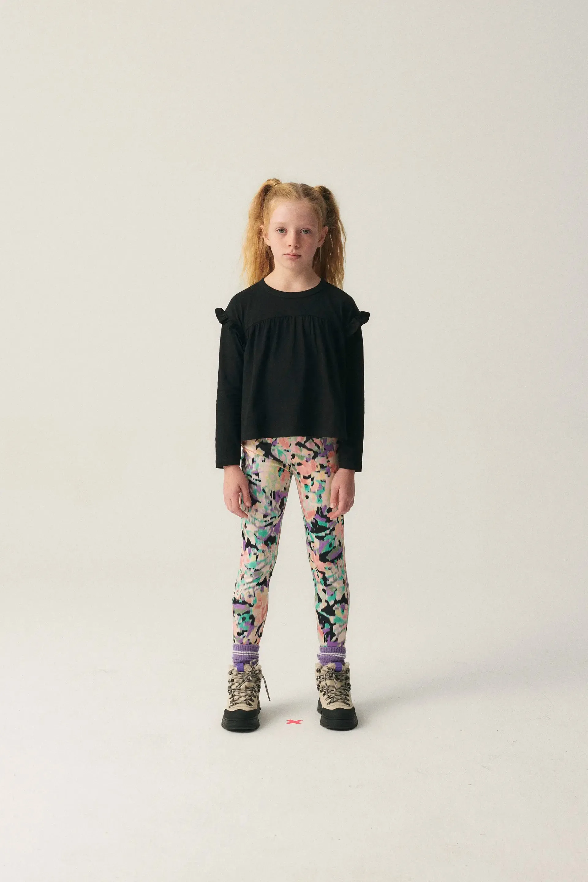 Top de niña con volantes negro sold by Compania Fantasica