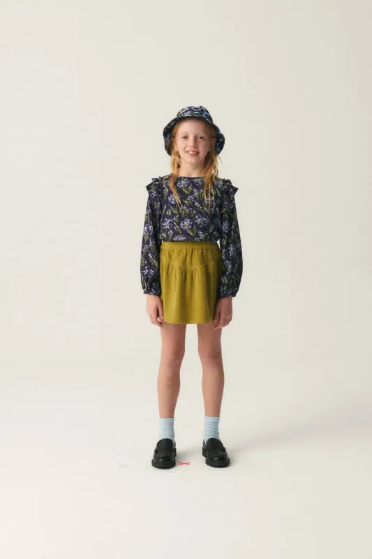 Top de niña en viscosa LENZING™ ECOVERO™ con estampado floral azul sold by Compania Fantasica