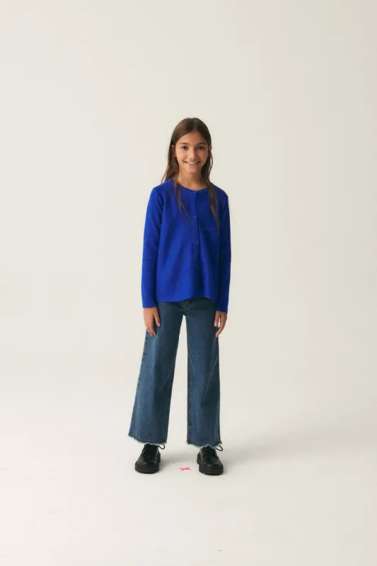 Cárdigan de niña de punto evasé azul sold by Compania Fantasica