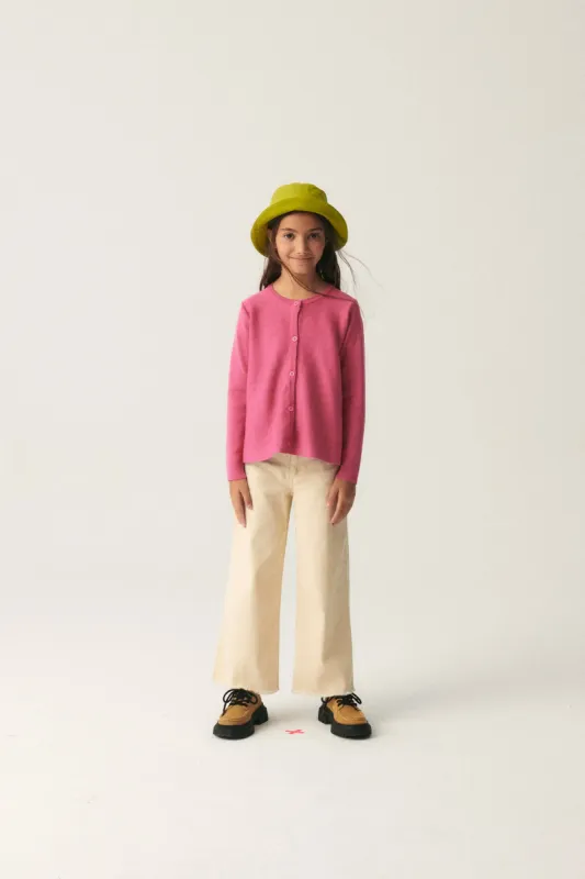 Cárdigan de niña de punto evasé rosa sold by Compania Fantasica