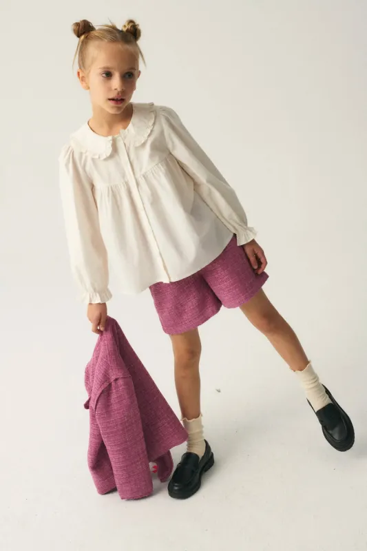 Camisa de niña con cuello bobo blanca sold by Compania Fantasica