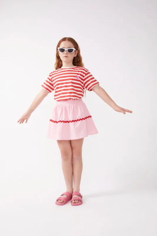 Falda corta de niña picunela rosa sold by Compania Fantasica