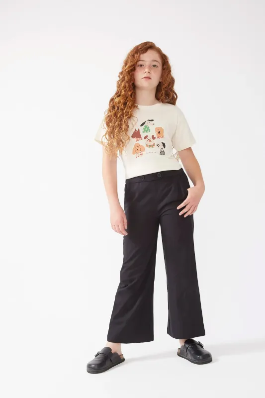 Pantalón de niña recto botones negro sold by Compania Fantasica