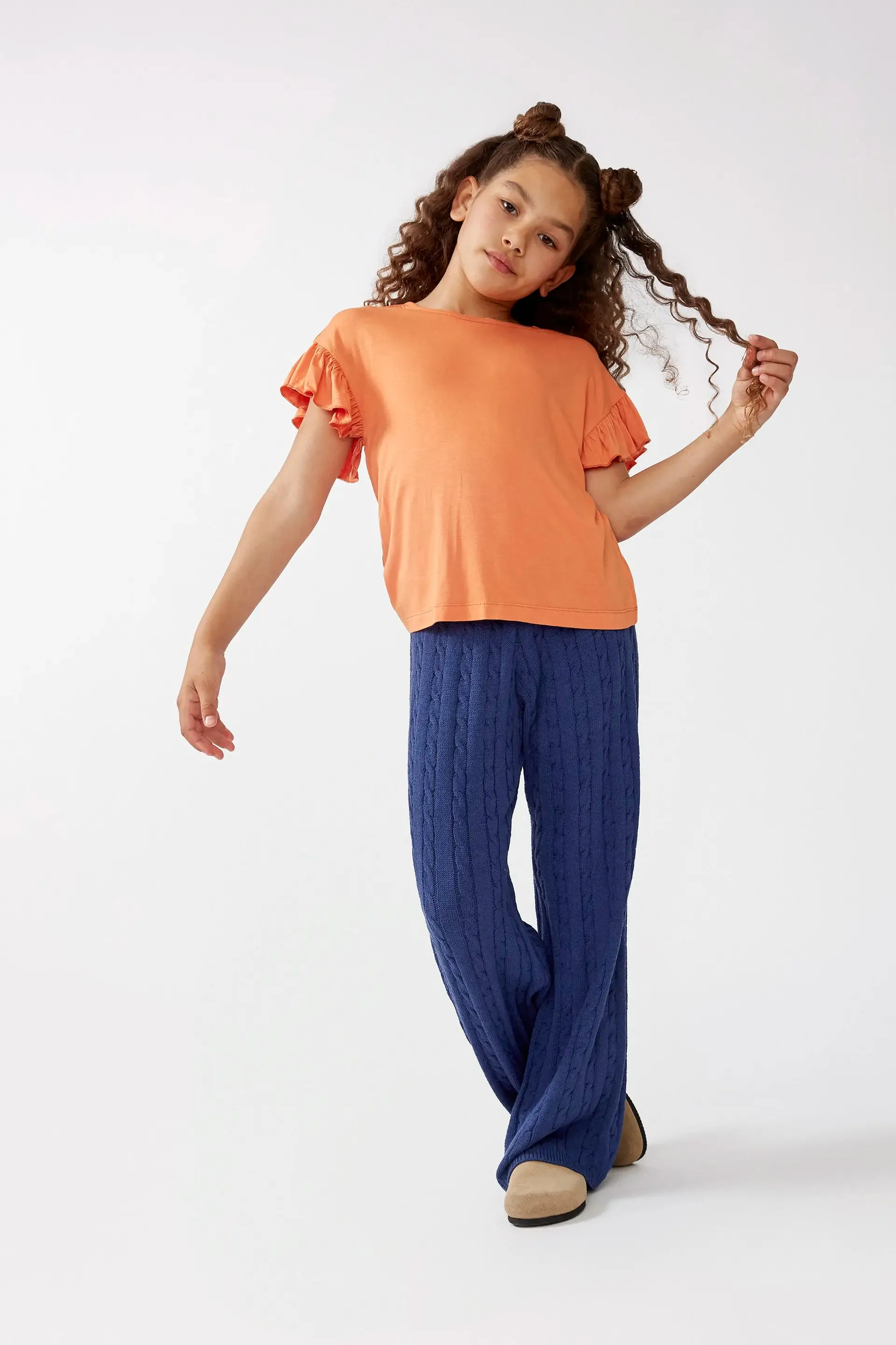 Top de niña con volantes naranja sold by Compania Fantasica