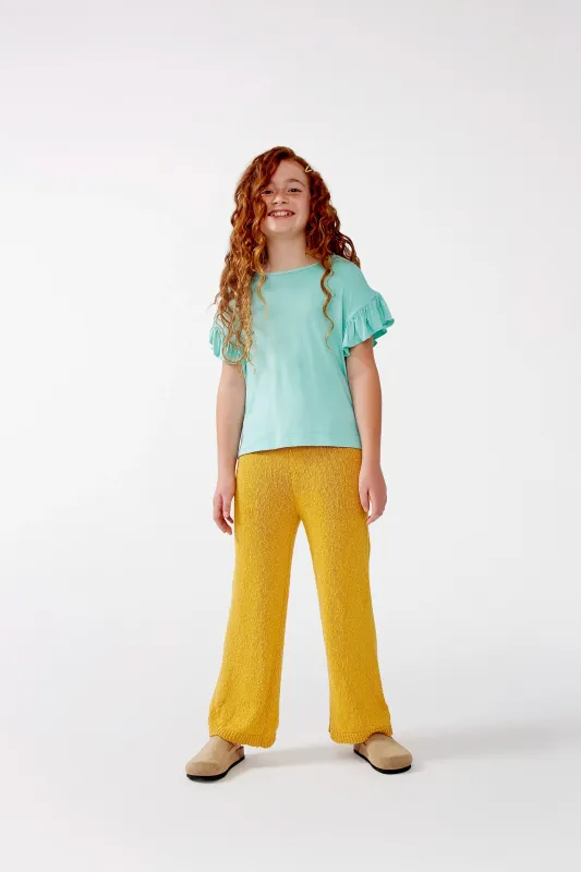 Top de niña con volantes azul sold by Compania Fantasica