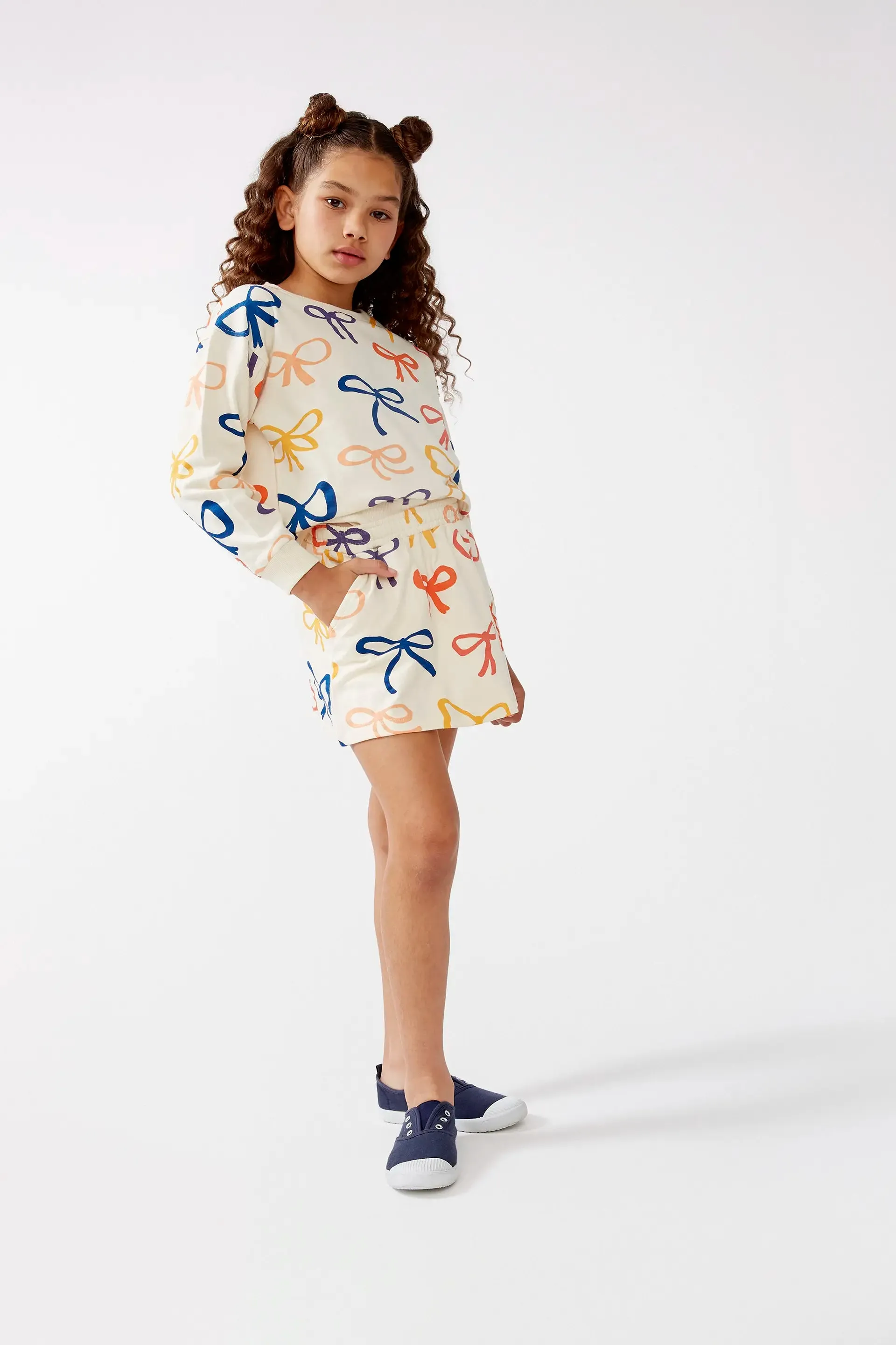 Falda corta de niña estampado de lazos sold by Compania Fantasica