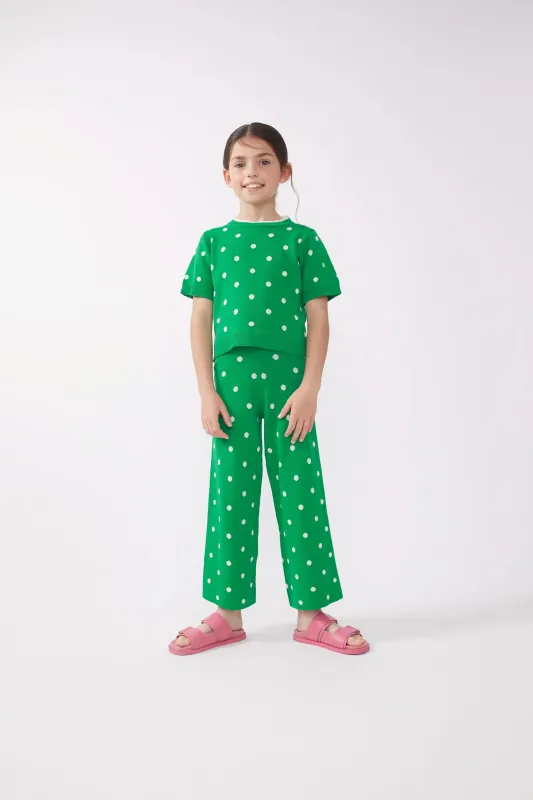 Pantalón unisex lunares verde sold by Compania Fantasica